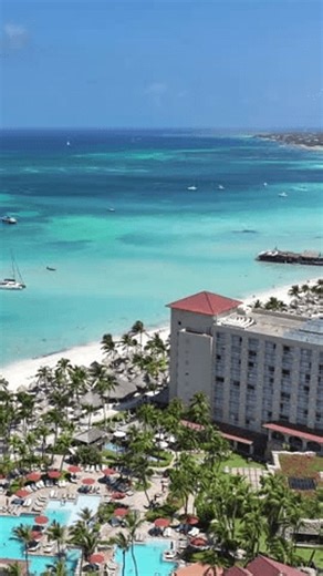 clip-3996294123-high-rise-hotels-palm-beach-oranjestad-aruba