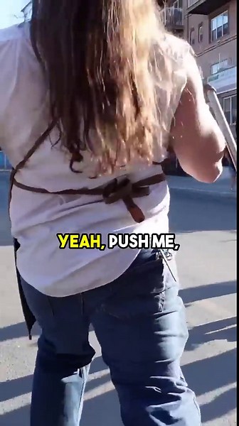 Model causes a scene being pulled down street on toilet