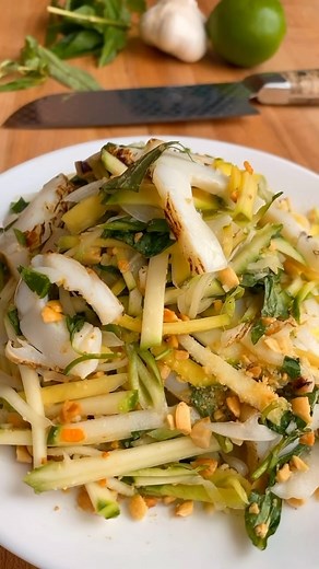 It’s salad season and I think you’re going to like this Vietnamese Green Mango & Cuttlefish Salad - Goi Xoai Xanh Muc! It’s the perfect balance of flavors and textures. I love love the sourness and crunchiness of the green mango, and I can never resist ordering this whenever I see it on the menu. It’s so easy to make at home, hope you will try out this salad and enjoy! 1 cuttlefish 2-3 green mango julienned ( 2 larger mango or 3 smaller mango) 1/2 sweet onion thinly sliced 2 cups of chopped Viet