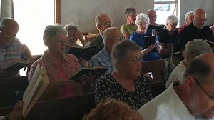 Hymn sing at historic Klein's meetinghouse today, next to Peter Becker Community. Ted Hughes leading here. | Mennonite Heritage Center