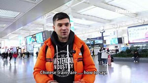 Int'l travelers marvel at convenience of China's high-speed rail