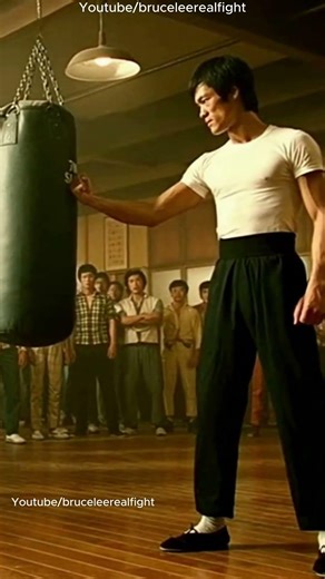Bruce Lee’s One-Inch Punch Sends a 700-LB Boxing Bag Flying