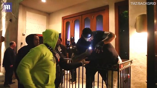 DaBaby looks on as his bodyguards brutally beat up a fan