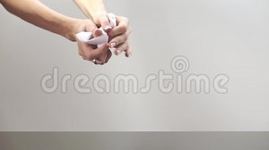 Female Hands Crumpling a Sheet of Paper Stock Video - Video of design, background: 73125633