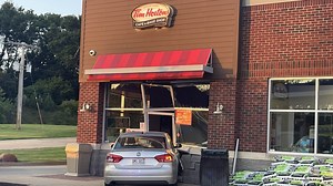 'Structural damage' after car crashes into Tim Hortons in Lowell