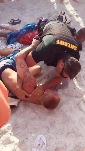A&E | A GIGANTIC cop shuts down a spring break beach brawl! 👊 #CustomerWars | Instagram