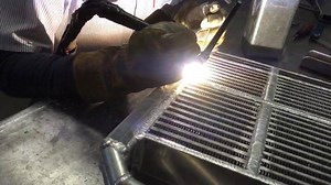 Beautiful day to match the beautiful weld job Kyle performed on this Ford 55D Backhoe hydraulic transmission cooler! #NowThatsCool #WhatCanWeBuildforYou? | Radiator Supply House