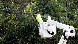 Why aren't powerlines buried underground in storm-battered areas? Short answer, money