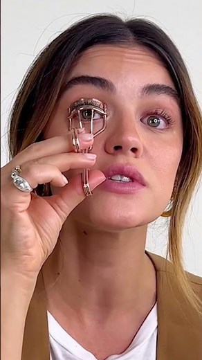 Lucy Hale shows how she curls her lashes...and the occasional fear while doing it.