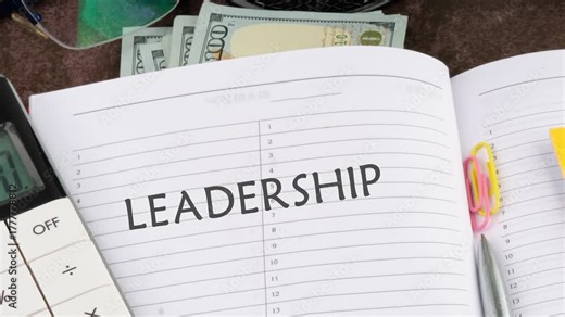 Leadership Leader Management Coaching Concept . Animation of the LEADERSHIP concept text in an open business notebook on a blank sheet.