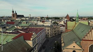 Market Square from above, aerial view of old city center view in Krakow. Old Town Main Market Square. Famous cathedral Saint Marys Basilica in Krakow Poland. Wawel Royal Castle, Krakow, Poland