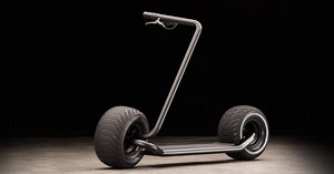 Stator folding electric scooter pairs plump wheels and wiry frame