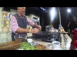 Andrew Zimmern Demos Wok-Tossed Crickets with Chives & Black Beans