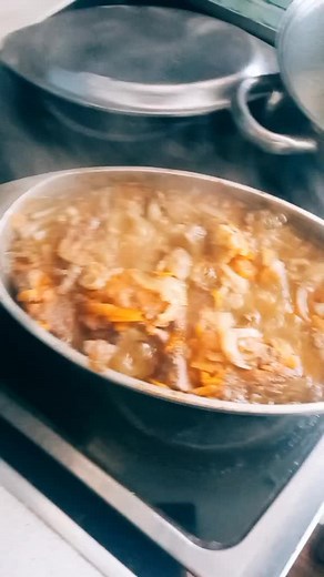 Cooking Meat and Vegetables in a Large Pot