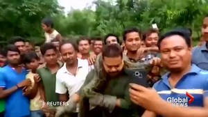 Park Ranger taking selfie with python is nearly strangled
