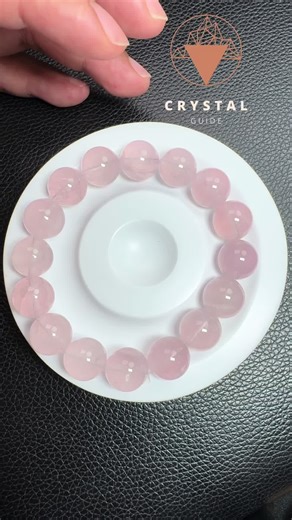 Pink quartz, also known as rose quartz, is renowned for its gentle pink essence and is often called the stone of unconditional love. It carries a soft feminine energy of compassion and peace, tenderness and healing, nourishment, and comfort. Its functions include: 1. **Emotional Healing**: Rose quartz is believed to help in emotional healing, reducing stress, and promoting calmness and peace. 2. **Love and Relationships**: It is often used to attract love, enhance self-love, and improve relation