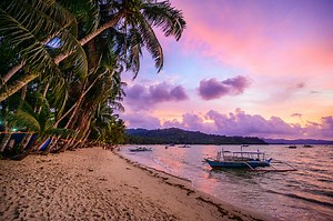 Port Barton Beach at sunset on paradise island, tropical travel...