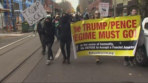 Antifa demonstrators rally, march in downtown Portland