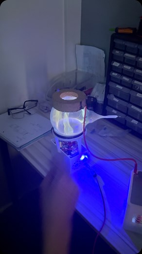 Tate McAluney on Instagram: "Tungsten carbide plasma flask experimentation with my 200W inductively coupled plasma generator + capacitive coupling to my flyback power supply. I have a lot of footage to edit into a new YouTube video but it will come out before the end of the year. Before that, enjoy this clip. #plasma #ee #rf #jesussaves #science #stem Globe made by @teslacoilpro Coil wires from @bntechgo_copperwires Device inspired by @magic_plazma"