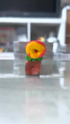 Watching @tomatoda_make chop her canes is satisfying 🤩 • • #claycane #polymerclaycane #claybeads #polymerclay #clay #handmade #polymerclaycanes #slicing #mario #claycanes #beads #supermario #mariobros #videogame #cute #kawaii #anime #polymerclaycreations #fimo #kawaiiclay #charm #charms #polymerclaycharms #claybead #nintendo #fireflower #fireflowers #flameflower | British Polymer Clay Guild