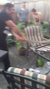 Guy cuts watermelon with sword... and the whole table!