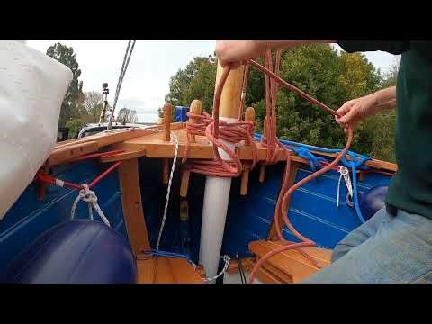 Ilur cruising dinghy. Using belt and braces to keep Tilly's mast up.