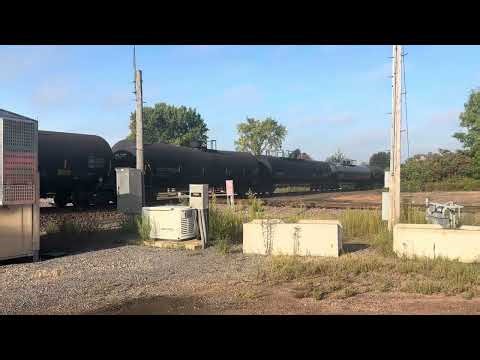 CN2964 ES44AC leading a freight train. Trailing units CN3164 ET44AC & CN3860 ES44AC.