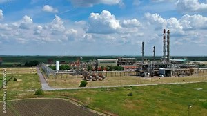 Aerial View of Petrochemical Plant. Natural Gas Processing Plant Drone Point of View. Petrochemical Plant in Agricultural Landscape. Natural Gas is a Flammable Gas, Consisting Mainly Of Methane (CH4)