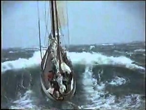 Sailingyacht between big waves sailing