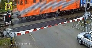 Watch: Man walks away after being hit by train