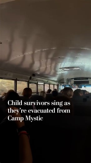 Child survivors sing as they evacuated from Camp Mystic