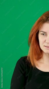 shot with fingers shot gesture karate gesture woman shows belligerence looks to the side hand signs dissatisfaction negative emotions solve problem Green chromakey background