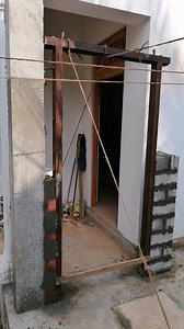 🚪🔧 Hole Pass for Door Frames! We use the hole pass tool to perfectly position and stabilize the door frame with the wall. ▶️One side of the tool is fixed to the door frame using a wire nail. ▶️The other side is placed between the brick/block layers during the wall is being built. ▶️Space between two hole pass tools is 500mm ▶️This process is carried out to the both vertical sides of the frame. This method guarantees that the door frame is firmly fixed and remains stable when the door is functi