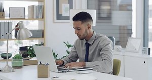 Angry businessman, laptop and hammer in destruction for loss, fail or stress at office. Frustrated man or employee hitting faulty or damaged equipment by computer in rage or violence at workplace