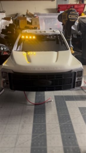 @defender_customs on Instagram: "Going a different route on the 2023 F250 shoptruck for strobes. Rather than the normal overhead strobe bar, i decided to design an interior lightbar. I originally had another board hooked up with different patterns, but i shorted the board out and fried it. So this one will have to do. #scalerc #scaler #tinytrucks #worktruck #shoptruck #superduty #3ddesign #3dprinting"