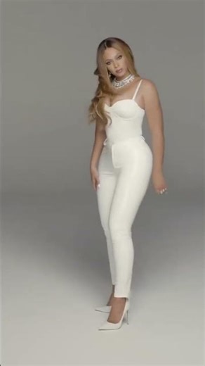 Beyonce wearing white latex trousers and white stiletto heels #beyonce #latex