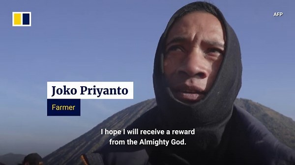 Active Indonesian volcano draws worshippers for ritual sacrifice during Yadnya Kasada festival