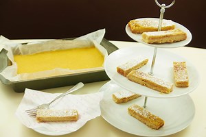 This recipe must be tried to understand just how deliciously lemony they are. Watch us make the world's yummiest Lemon Bars and try baking them yourself at home from The Hummingbird Bakery Cookbook. | The Hummingbird Bakery