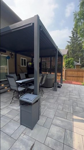 The Hanso Pergola. This aluminum pergola looks looks amazing on this patio! #backyarddesign #patio