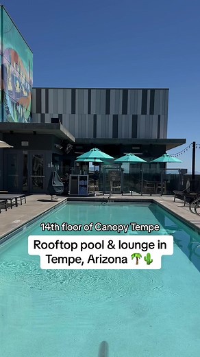 This rooftop pool in Downtown Tempe is one of the best places to spend a warm Arizona day. ☀️ Soak up the sun and drink in the views at Alibi Temp located on the 14th floor of Canopy Tempe. 🌴 Cool off in the sparkling pool, enjoy some music, and catch a tan while you lay out on the day beds or cabanas. Food and drinks are available to order at the bar and you'll find delicious items like flatbreads, tacos, and salads on the food menu. And with a full bar, you can sip on whatever pleases your pa