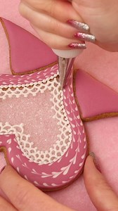 I used pre-cooked Isomalt from @simicakes1 and sparkling sugar from @kingarthurbaking to create the frosted glass look on these Valentine's Day cookies. The full tutorial and recipes are in the Cookie Art Club! #decoratedcookies #handmade #royalicing #sweetambscookies #Valentinesdaycookies | SweetAmbs