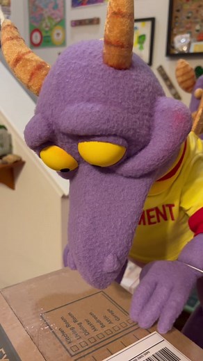 Figment gets a popcorn bucket! #Puppet #Fyp #Disneyworld #epcot #disney #figment #figmentpopcornbucket @disneyparks