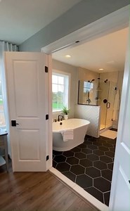2.3K views · 39 reactions | We are excited to announce that our Manchester English Cottage in Mechanicsburg, PA was awarded Best Bath at this year's Harrisburg Parade of Homes! This Serenity bath features a freestanding tub, walk-in shower, double vanity, and some of our newest tile options. Check out the rest of this model here: https://bit.ly/3tqvL8P | Keystone Custom Homes | Facebook