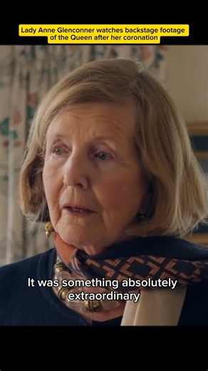 Lady Anne Glenconner watches backstage footage of the Queen after her coronation