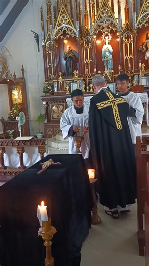 On All Souls’ Day, the priest blesses the " "Catafalque—a symbolic representation of the faithful departed—during the solemn Requiem Mass in the Traditional Latin Rite. Draped in black and surrounded by candles, it stands as a powerful reminder of the Church’s prayers for the souls in Purgatory: “Requiem aeternam dona eis, Domine, et lux perpetua luceat eis.” | Catholic Tradition & Evangelization