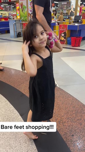 Bare Feet Shopping Experience with Father and Daughter
