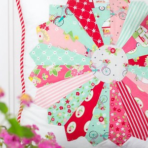 104K views · 89 reactions | Do you want to learn how to make a Dresden Plate Pillow? Yes, you do, because Dresden plates are the perfect way to show off a whole lotta fabrics, wink! They just scream be scrappy, right? Follow the video to see how to easily attach your Dresden plate to a pillow and finish the Dresden plate to complete your project. https://www.coralandco.com/how-to-make-a-dresden-plate-pillow-easily-attach-a-dresden-plate.html | Coral & Co. | Facebook