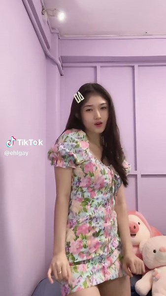 Floral Dress Movement in Soft Lighting Room