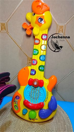 𝐊𝐈𝐃𝐃𝐈𝐄𝐒 𝐓𝐇𝐑𝐈𝐅𝐓 𝐕𝐄𝐍𝐃𝐎𝐑 𝐈𝐍 𝐋𝐀𝐆𝐎𝐒 on Instagram: "VTech Zoo Jamz Tiger Rock Guitar, a musical instrument toy for toddlers💞💙💕 It features eight light-up buttons and strings for interactive play. The toy includes 30 built-in melodies and 10 sing-along songs about animals. Users can switch between acoustic, electric, or distorted electric guitar sounds. It helps develop cognitive skills and fine motor skills. #thriftvendors#childrentoys#toyshopinlagos #15,000✅ PAYMENT VALID