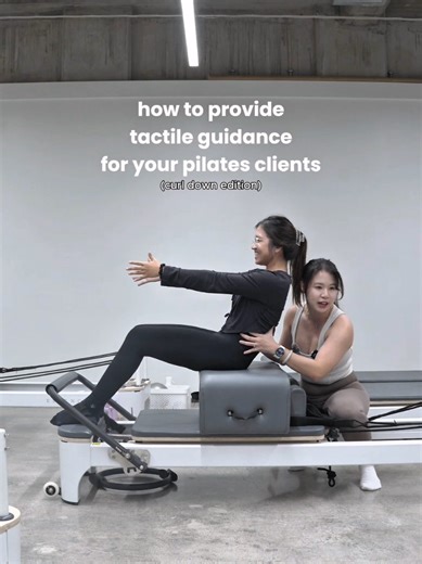 Learning how to tactile guide comes from understanding the anatomy of the joints and muscle (movement planes and muscle fiber directions) and then understand the Pilates moves well. In curl down based movement, we always see exaggerated thoracic flexion and the lack of flexion in the lumbopelvic region, which often times means underutilising the abdominals and more of pect engagement instead due to the round shoulders and chest. Understanding the movement of the pelvis and spinal segments along